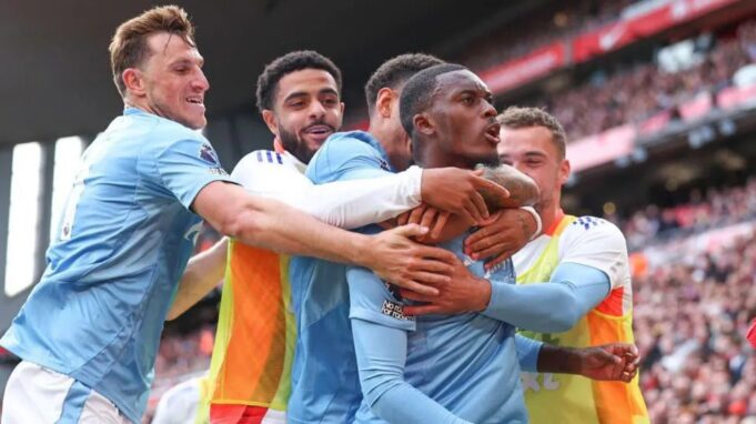 Callum Hudson-Odoi celebrates after scoring against Liverpool at Anfield.