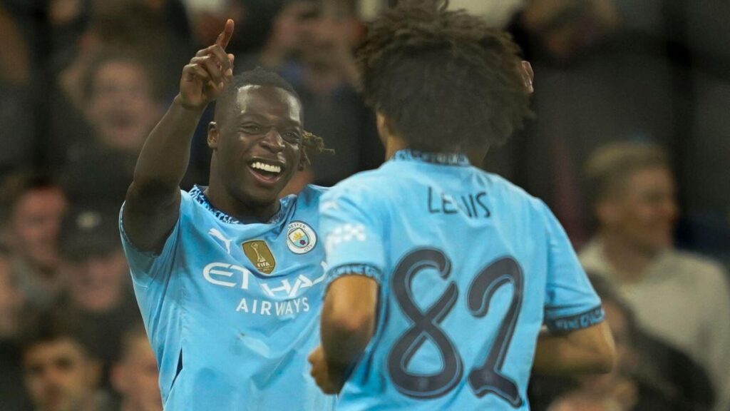 Doku celebrates scoring against Watford in the EFL Cup.