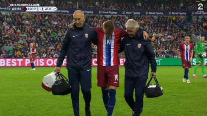 Martin Odegaard limps off the field while playing for Norway