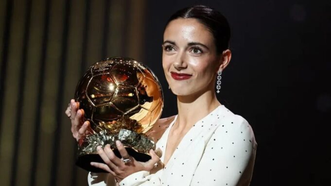 Barcelonas Spanish midfielder Aitana Bonmati receives the Woman Ballon dOr award