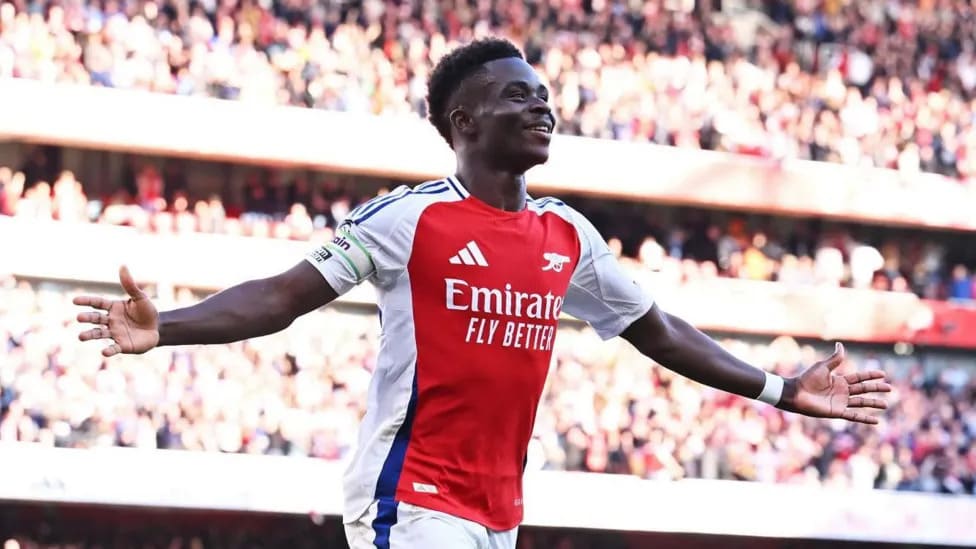 Saka celebrates scoring against Southampton at the Emirates.