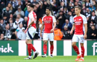 Newcastle United Stuns Arsenal, Alexander Isak Early Strike Seals the Win William Saliba of Arsenal looks dejected after Alexander Isak of Newcastle United (not pictured) scores his team's first goal