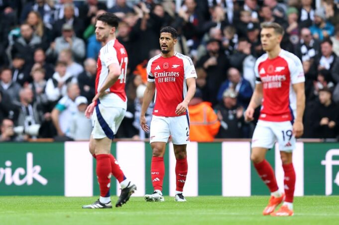 William Saliba of Arsenal looks dejected after Alexander Isak of Newcastle United (not pictured) scores his team's first goal